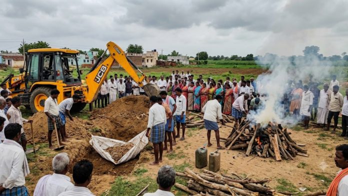 Buried body exhumed and cremated to bring rains.
